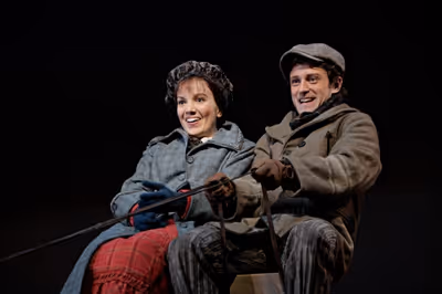 Kara Lindsay as Laura Ingalls and Kevin Massey as Almanzo Wilder Photo